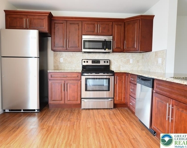 7406 Allemaengel Road - Photo Thumbnail 3