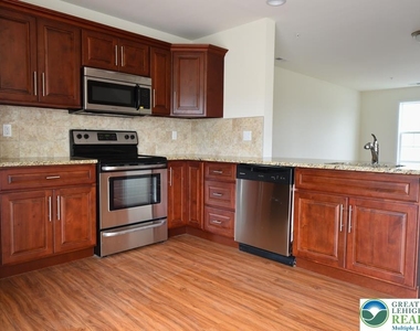 7406 Allemaengel Road - Photo Thumbnail 6