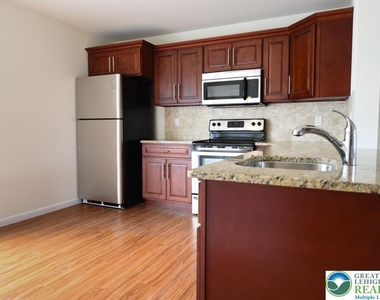 7406 Allemaengel Road - Photo Thumbnail 4