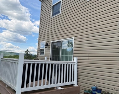 7406 Allemaengel Road - Photo Thumbnail 1