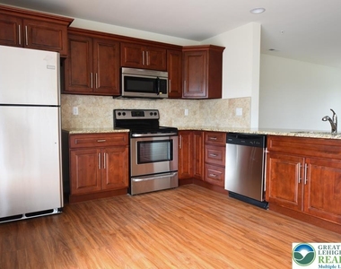 7406 Allemaengel Road - Photo Thumbnail 5