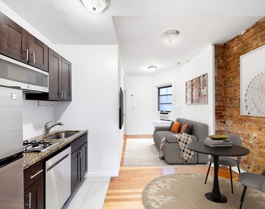 St Marks Place, between 3rd and 2nd ave - Photo Thumbnail 3