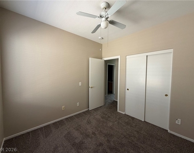 10975 Pumpkin Ridge Avenue - Photo Thumbnail 9