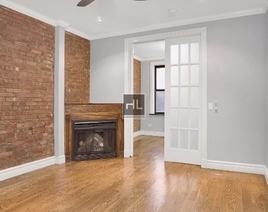 E 23rd St. - Photo Thumbnail 1