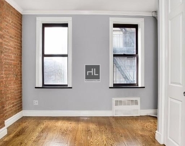 E 23rd St. - Photo Thumbnail 3