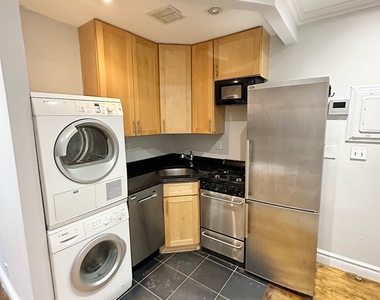 E 13th St. - Photo Thumbnail 2