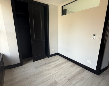 W 52nd St. - Photo Thumbnail 4