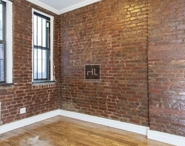 E 13th St. - Photo Thumbnail 3