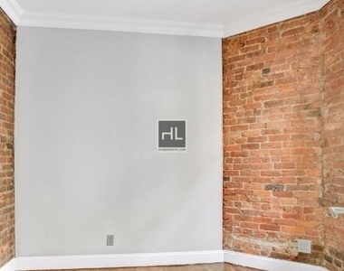 E 13th St. - Photo Thumbnail 5