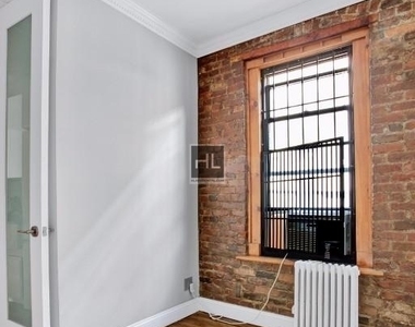 E 13th St. - Photo Thumbnail 4