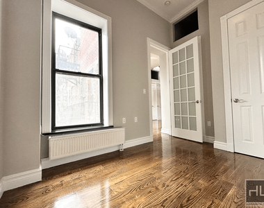 E 13th St. - Photo Thumbnail 4