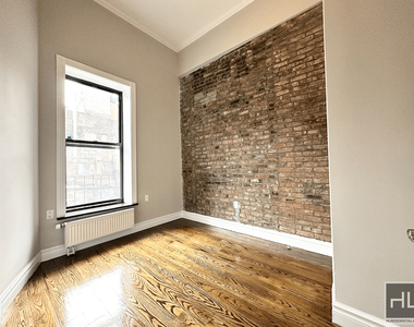 E 13th St. - Photo Thumbnail 5