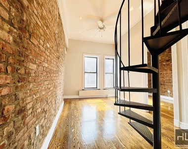 E 13th St. - Photo Thumbnail 1
