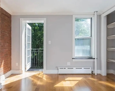 E 7th St. - Photo Thumbnail 4