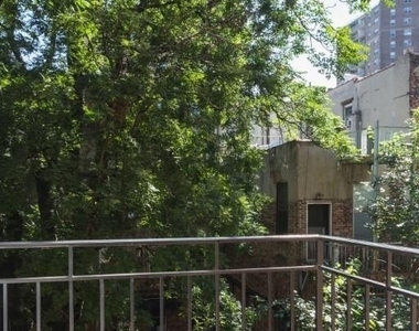 E 7th St. - Photo Thumbnail 5
