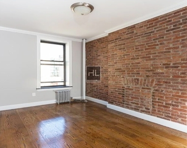 W 52nd St. - Photo Thumbnail 4