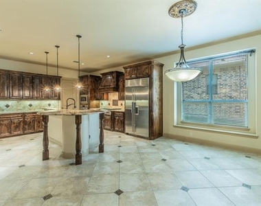 7565 Rawlins Lane - Photo Thumbnail 9