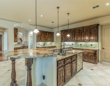 7565 Rawlins Lane - Photo Thumbnail 8