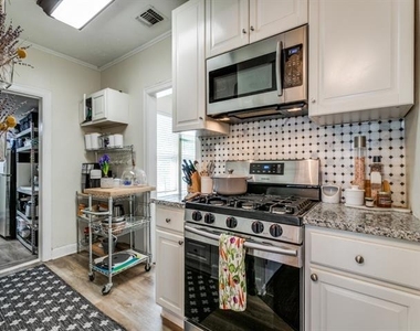 6110 Junius Street - Photo Thumbnail 6