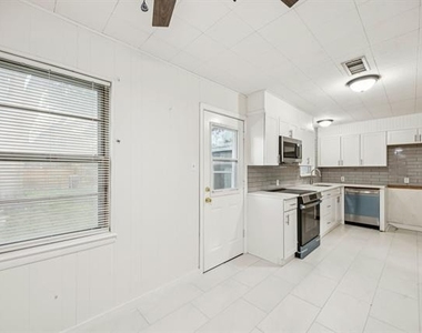 10042 Brockbank Drive - Photo Thumbnail 3