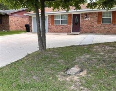 1214 Wolfe City Drive - Photo Thumbnail 2