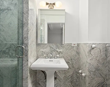 East 68th Street - Photo Thumbnail 6