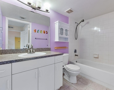 5011 Wiles Road - Photo Thumbnail 3