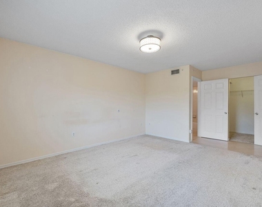 5011 Wiles Road - Photo Thumbnail 1
