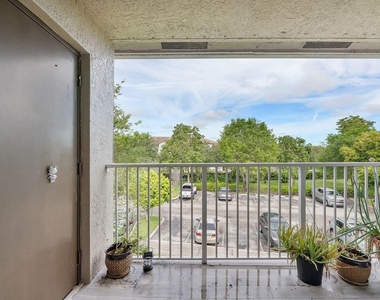 5011 Wiles Road - Photo Thumbnail 16