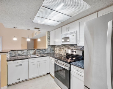 5011 Wiles Road - Photo Thumbnail 12
