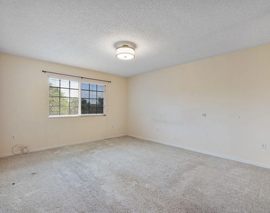 5011 Wiles Road - Photo Thumbnail 2