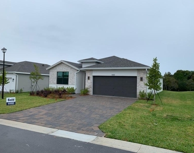 1949 Ne Ocean Dunes Drive - Photo Thumbnail 1