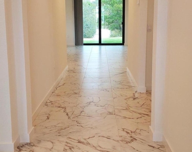 1949 Ne Ocean Dunes Drive - Photo Thumbnail 2