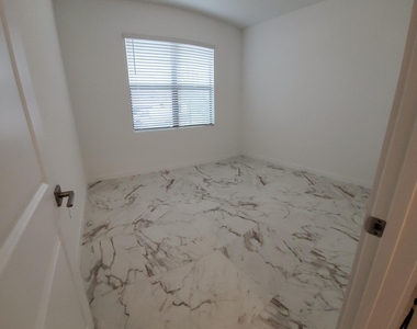 1949 Ne Ocean Dunes Drive - Photo Thumbnail 3