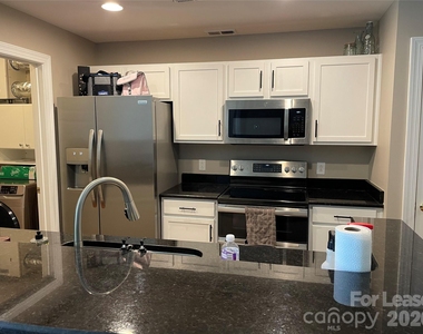 718 W Trade Street - Photo Thumbnail 7