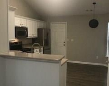 14128 Riding Hill Avenue - Photo Thumbnail 4