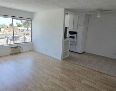 1308 N Poinsettia Place - Photo Thumbnail 1