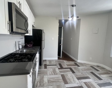 1129 Rogers Avenue - Photo Thumbnail 1