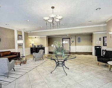 10570 Main Street - Photo Thumbnail 16