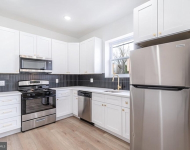 5758 Spruce Street - Photo Thumbnail 4