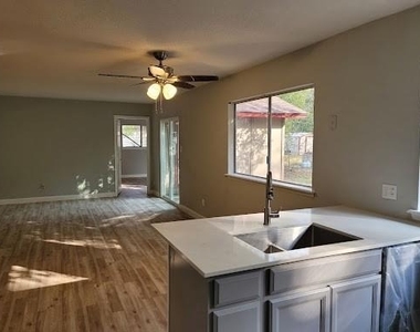 6317 Thurgood Ave - Photo Thumbnail 2