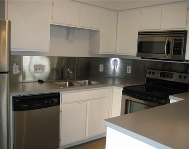 1013 W 23rd St - Photo Thumbnail 2