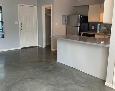1013 W 23rd St - Photo Thumbnail 1