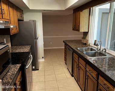 6137 Island Forest Drive - Photo Thumbnail 1