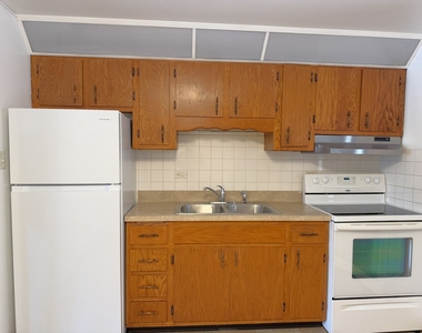 7601 W 61 Place W - Photo Thumbnail 1