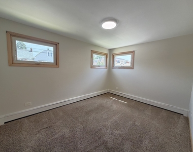 7601 W 61 Place W - Photo Thumbnail 5