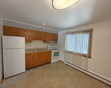 7601 W 61 Place W - Photo Thumbnail 2