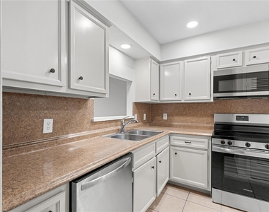 9306 Tooley Drive - Photo Thumbnail 8