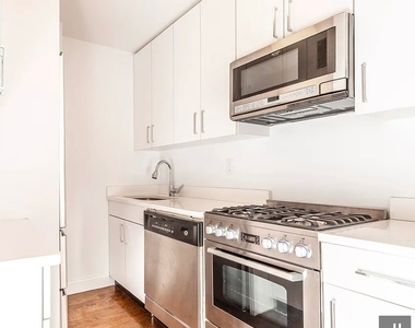 E 82 St - Photo Thumbnail 1