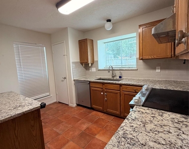 5211 Rivertree Lane - Photo Thumbnail 3